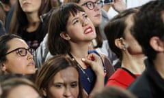 People in the crowd at Hillary Clinton’s 2016 US presidential Election Night event watch results begin to come in on a big screen at the Jacob K. Javits Convention Center in New York, New York.