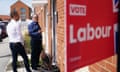 Keir Starmer in shirtsleeves standing on the doorstep of a house in North Yorkshire with Luke Charter, Labour's parliamentary candidate for York Outer