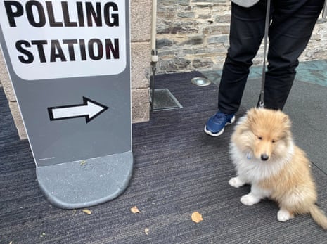 Little Oscar on his first visit to the polling station.
