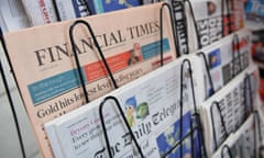 Rack of British newspapers on sale in central London.