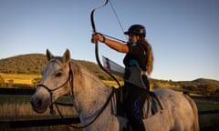Horse archery participant Kimberley Robertson aiming her bow in Hirstglen, Queensland