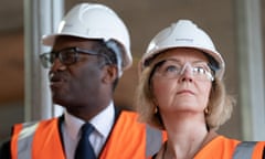 Liz Truss and then chancellor Kwasi Kwarteng in hard hats during a ministerial visit