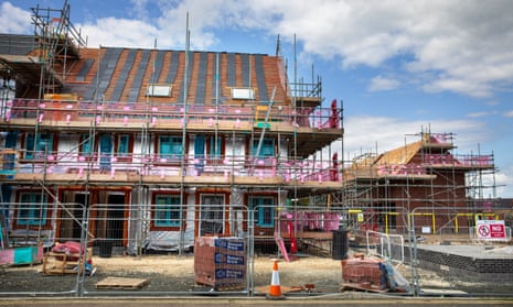 Scaffolding around new homes under construction