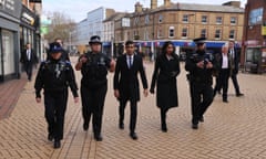 Rishi Sunak and Suella Braverman with police officers in Chelmsford, Essex, to announce measures to counter antisocial behaviour, March 2023