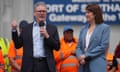 Keir Starmer speaking into a microphone while standing next to Rachel Reeves