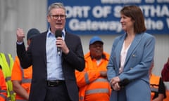 Keir Starmer speaking into a microphone while standing next to Rachel Reeves