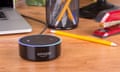 Amazon echo dot, a hands free voice controlled device that connects to the Alexa voice service on a wooden desktop<br>MPTP5F Amazon echo dot, a hands free voice controlled device that connects to the Alexa voice service on a wooden desktop