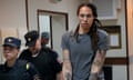 A handcuffed Brittney Griner is escorted from court near Moscow by Russian guards on 4 August 2022.