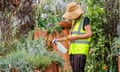 Working on World Child Cancer's Nurturing Garden, designed by Giulio Giorgi, at the RHS Chelsea Flower Show 2024.