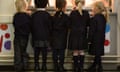 Primary school children queueing for breakfast at a canteen