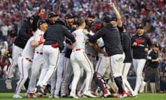 The Minnesota Twins storm the field after defeating the Toronto Blue Jays