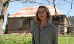 Asher Keddie outside a bush shack in Fake