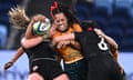Australia’s Atasi Lafai is tackled by Canada’s Sophie de Goede and DaLeaka Menin&nbsp;in their Pacific Four match in Sydney.
