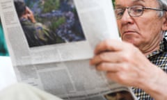 Man read newspapers<br>Posed by model Older man reading newspapers