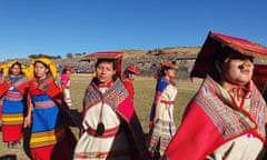 Young women representing Acllas, the Virgins of the Sun, sweep past as part of a finely choreographed spectacle.