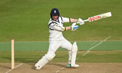 Alex Davies leathers a shot on the way to his double century