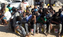 Illegal migrants sit in a port in Tagiura, east of the Libyan capital Tripoli, after 137 migrants of African origins were rescued by coast guard boats off the coast of Libya on July 21, 2016.  / AFP PHOTO / STRINGERSTRINGER/AFP/Getty Images
UKAID