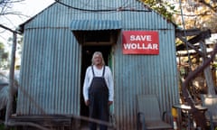 Col Faulker, 68, over 40-year resident of Wollar, NSW standing at the entrance of his home. A town now predomintaly owned by American coal-mining company Peabody.