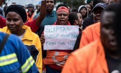 FILES-SAFRICA-ECONOMY-MINING-STRIKE<br>(FILES) In this file photo taken on February 22, 2018 Employees and contractors of the Optimum Coal Mine in Hendrina, owned by the controversial Gupta family, demonstrate with a placard reading 'Guptas - stop gambling with our lives' in front of the gates of the mine in Hendrina, South Africa. - Two wealthy Indian-born business brothers who were allegedly at the centre of a massive web of state corruption in South Africa have been arrested in Dubai, Pretoria announced on June 6, 2022. The arrests came as a probe was concluded into massive plundering of state institutions during former president Jacob Zuma's era. South Africa's justice ministry "confirms that it has received information from law enforcement authorities in the United Arab Emirates (UAE) that fugitives of justice, namely, Rajesh and Atul Gupta have been arrested," it said in a statement. (Photo by MARCO LONGARI / AFP) (Photo by MARCO LONGARI/AFP via Getty Images)