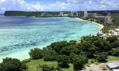 FILE -- This Aug. 14, 2017 file photo shows Tumon Bay near Hagåtña, Guam. The 1941 Japanese invasion of Guam, which happened on the same December day as the attack on Hawaii’s Pearl Harbor, set off years of forced labor, internment, torture, rape and beheadings. Now, more than 75 years later, thousands of people on Guam, a U.S. territory, are expecting to get long-awaited compensation for their suffering at the hands of imperial Japan during World War II. (AP Photo/Tassanee Vejpongsa, File)