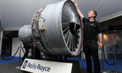 Farnborough International Airshow<br>Dustie Orton, a Graduate Manufacturing Engineer Trainee at Rolls Royce in Derby, checks over a Lego model version of one of their engines at the Farnborough International Airshow in Hampshire. PRESS ASSOCIATION Photo. Picture date: Thursday May 12, 2011. Around 1,400 exhibitors from more than 40 countries will be at Farnborough and include Sir Richard Branson, who will be giving an update on his Virgin Galactic space tourism plans. See PA story AIR Show. Photo credit should read: Steve Parsons/PA Wire