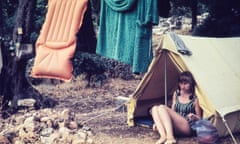 Young woman camping in the 1960s