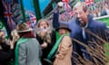 A racegoer celebrates after winning money in a lucky draw at a Paddy Power installation at the Cheltenham Festival in March.