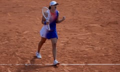 Iga Swiatek celebrates during the women’s singles semi-final match against Coco Gauff at the French Open on 6 June 2024