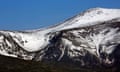 Mountain covered with blanket of snow