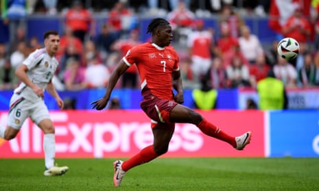 Breel Embolo of Switzerland scores his team's third goal against Hungary.