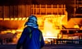 Workers by a blast furnace at Port Talbot steelworks in, South Wales in 2023.