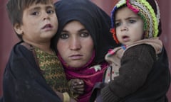 A woman and her children at a clinic for displaced people near Herat, Afghanistan.