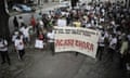 A banner carried by demonstrators at the closed street market reads: "Rain, death, flooding, and the end of our market. Acari weeps.” Rio’s best-known flea market, the Feira de Acari, January 2024