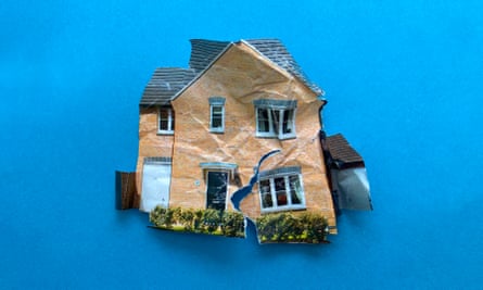 An illustration of a crumpled house on a blue background.