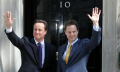 David Cameron and Nick Clegg enter Downing Street for the first day of joint goverment on 12 May 2010.