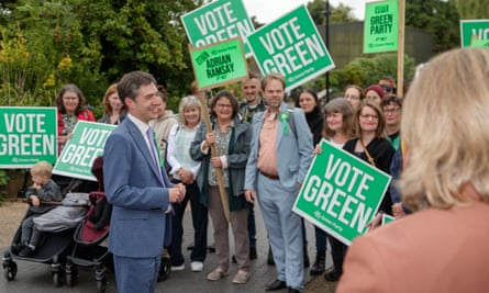 Ramsay smiles as he talks to supporters