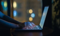 Woman works on laptop