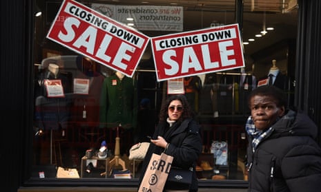 A shop advertises its closing down sale in London