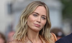 Emily Blunt poses for the camera at a photocall for the film Oppenheimer