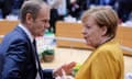 President of the European Council Donald Tusk (L) and German Chancellor Angela Merkel (R) during a summit in Brussels, where EU leaders agreed to a Brexit deadline extension