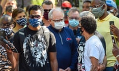 Protest against police abuse in Minneapolis<br>epa08459326 Gov. Tim Walz of Minnesota (blue shirt) talks with protesters as they demonstrate against police brutality at the Governor's Residence one week after George Floyd's death while under arrest, in St Paul, Minnesota, USA, 01 June 2020. A bystander's video posted online on 25 May, appeared to show George Floyd, 46, pleading with arresting officers that he couldn't breathe as an officer knelt on his neck. The unarmed Black man later died in police custody. According to news reports on 29 May, Derek Chauvin, the police officer in the center of the incident has been taken into costody and charged with murder in the George Floyd killing. EPA/CRAIG LASSIG