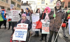 Disabled People Against Cuts hold a day of action against Maximus in London 2015. Maximus are due to carry out assessments on sick and disabled people on their capabilities to work. Protestors are concerned that many claimants will be wrongly found fit for work and lose their benefits.