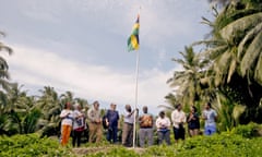 Officials raised the Mauritian flag above an atoll on the Chagos Islands, pictured, and sang the national anthem in a ceremony in February.