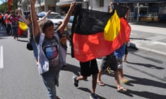 Aboriginal activists from the Noongar ‘Tent Embassy’ march down central Adelaide Terrace in Perth, Tuesday, Feb. 21, 2012. on their way to Government House to deliver a petition to the Queen. The activists delivered a petition to the Queen protesting a proposed $1 billion deal to settle native title claims over the state’s southwest region. (AAP Image/Cortlan Bennett) NO ARCHIVING