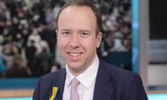 Matt Hancock smiling wearing a suit.