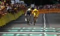 Jonas Vingegaard (left) on his way to a narrow win over Tadej Pogacar in a sprint finish.