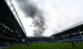 FA Cup - Fourth Round - Everton v Luton Town<br>Soccer Football - FA Cup - Fourth Round - Everton v Luton Town - Goodison Park, Liverpool, Britain - January 27, 2024 General view inside the stadium as smoke from a fire is seen outside before the match REUTERS/Carl Recine