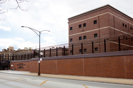 A walled and fenced jail building