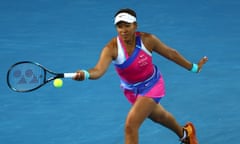 Naomi Osaka of Japan plays a forehand in a 2022 Australian Open match