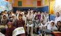Students attend a class at Mashal Model School on the outskirts of Islamabad, Pakistan